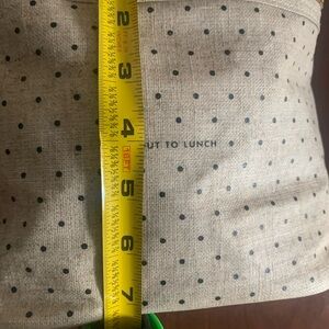 GUC -KATE SPADE New York Canvas “ out to lunch” bag. Tan with black dots.